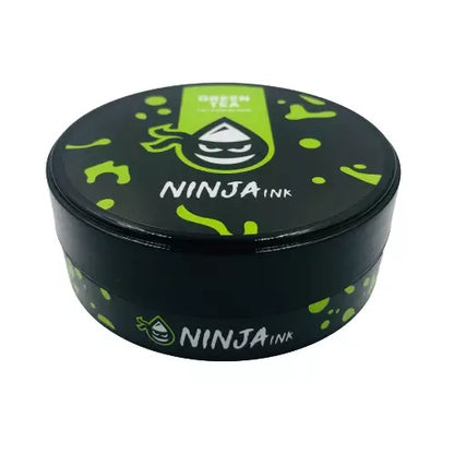 Tapa del envase de NINJA INK Tattoo Elixir Green Tea, crema para tatuajes de té verde