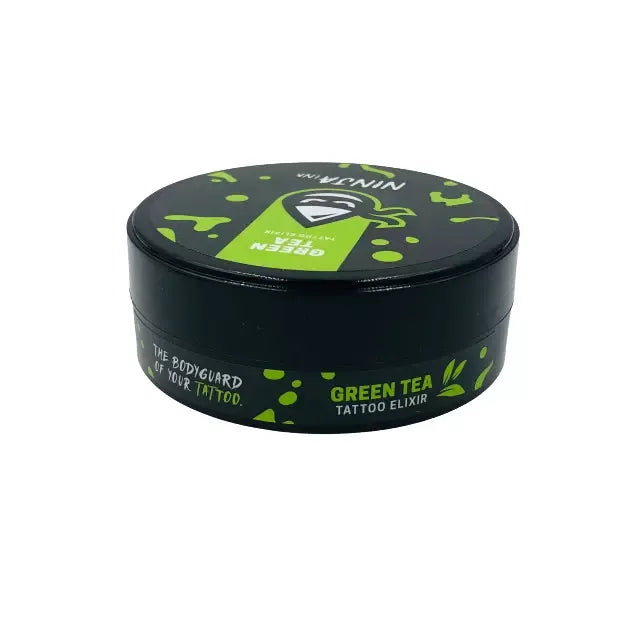 Lateral del envase de NINJA INK Tattoo Elixir Green Tea, crema de cuidado para tatuajes