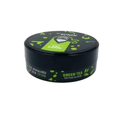 Lateral del envase de NINJA INK Tattoo Elixir Green Tea, crema de cuidado para tatuajes